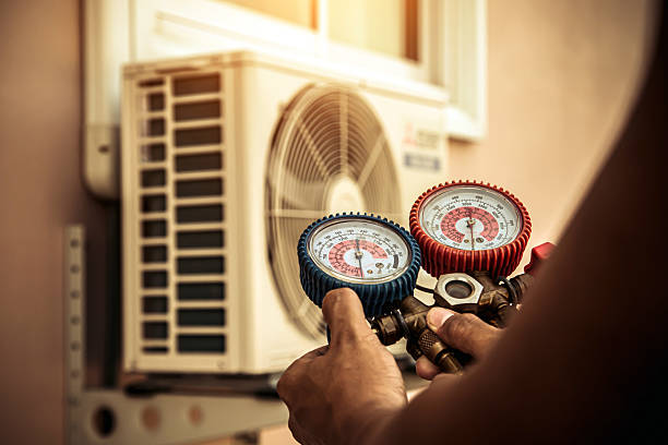 Professional Ac Installation technician working in Four Oaks, NC